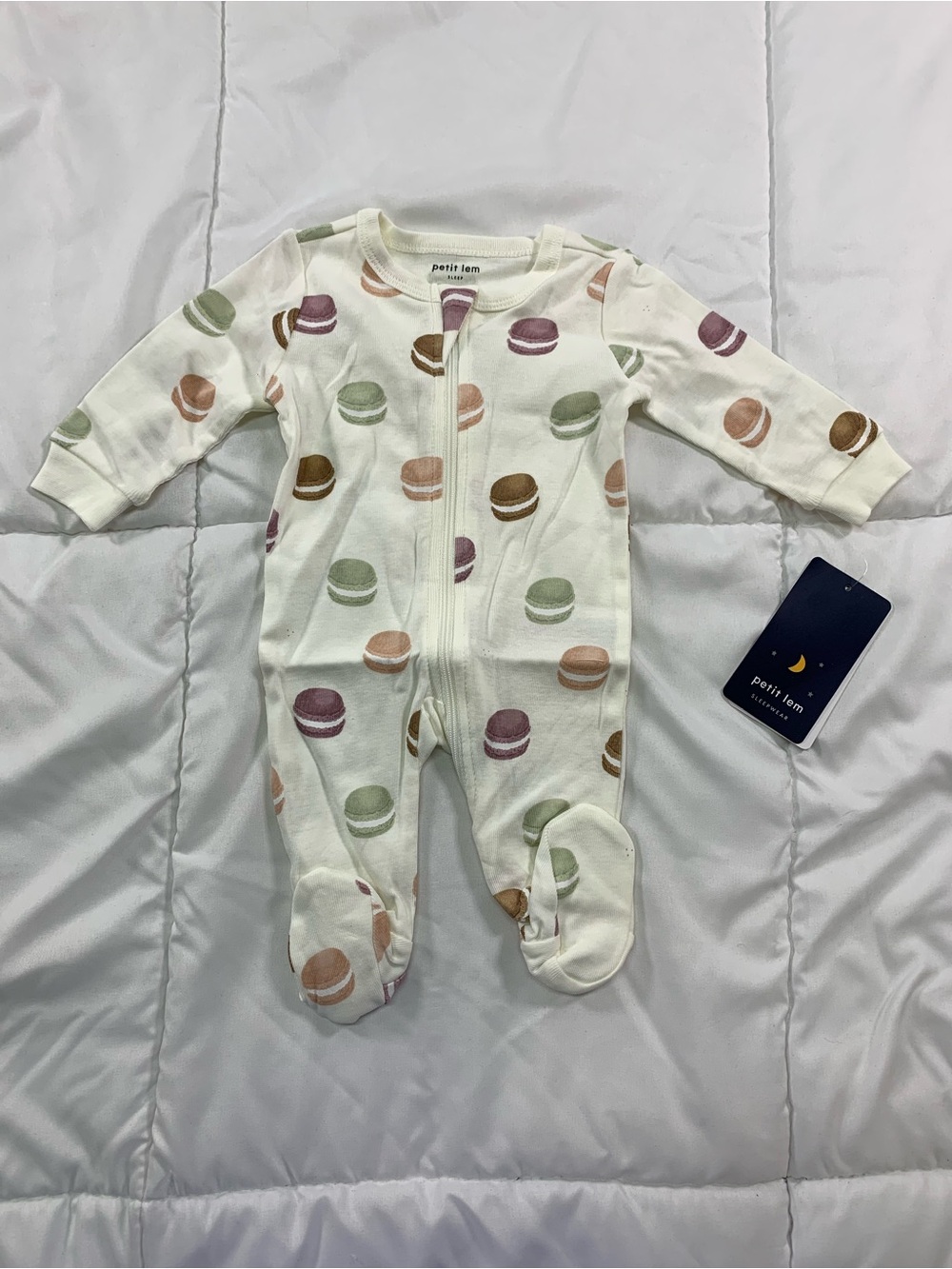 New petit lem footie pyjamas size NB